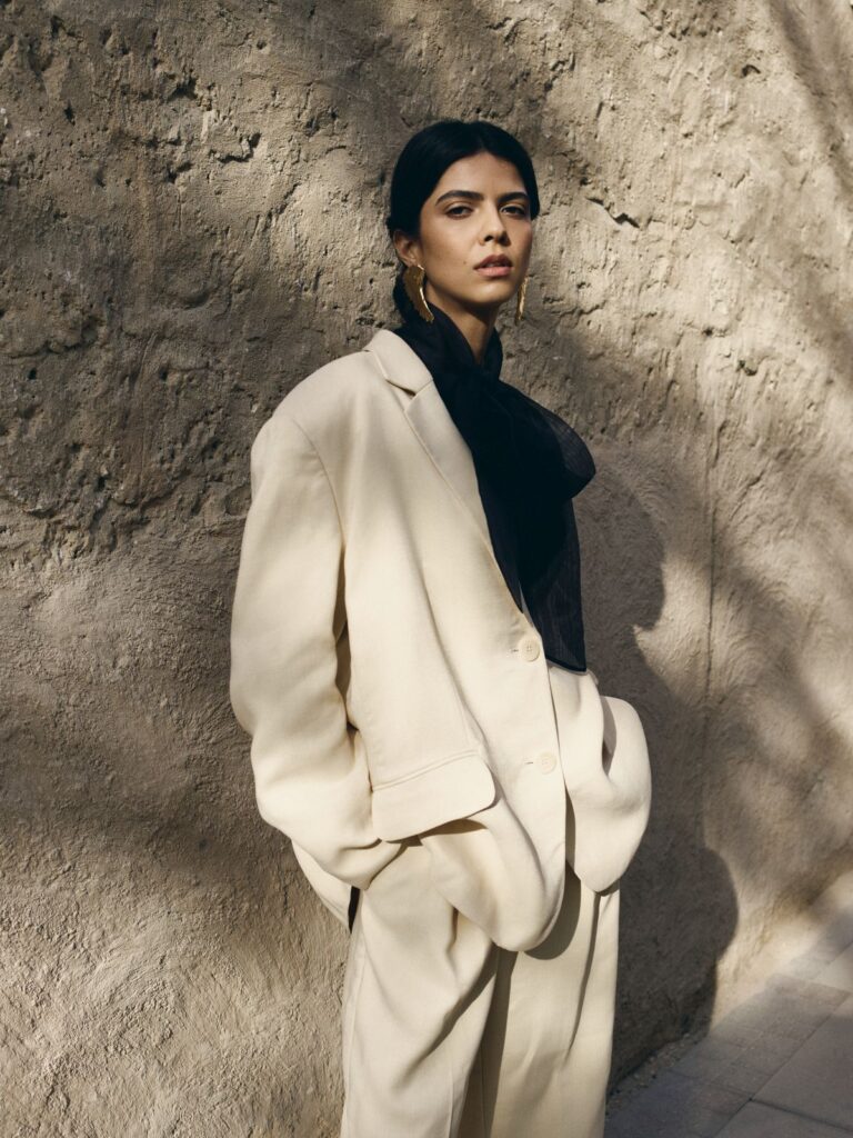 Suit, blouse: Karunas
Earrings: A.PRI Jewelry
Sandals: Rami Al Ali
DESERT MAGIC